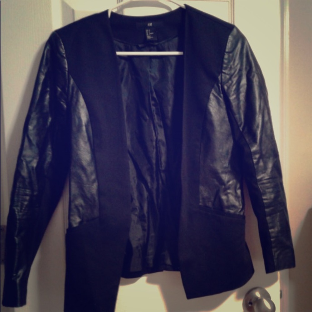Women's black and faux leather blazer.